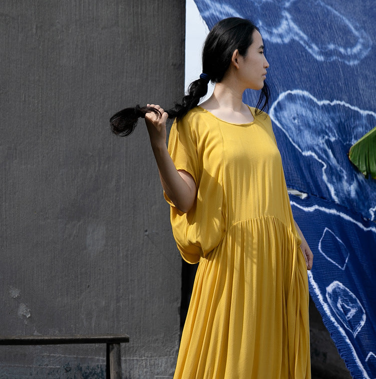 a new pleated long dress in early summer, irregular short-sleeved elegant and comfortable dress