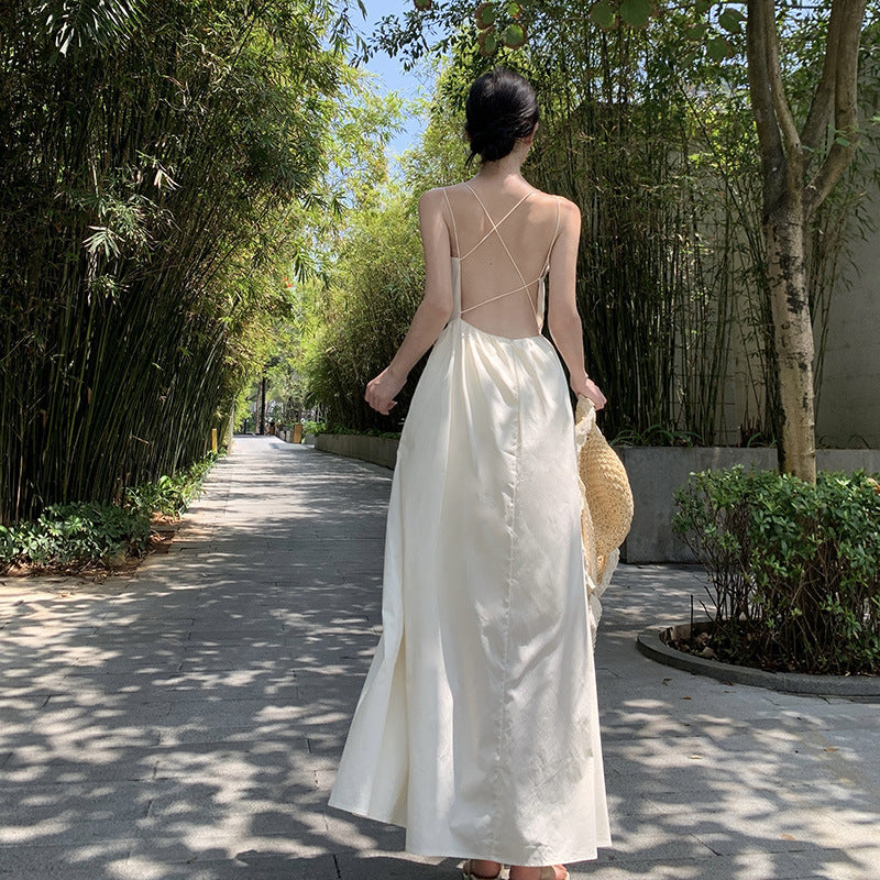 2025 Pure desire backless suspender dress female summer design sense Spice girl a word waist fairy seaside vacation long skirt
