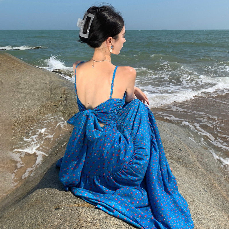 2025 Floral blue suspender dress women's 2025 summer new high-waisted and thin seaside vacation backless spice girl long dress