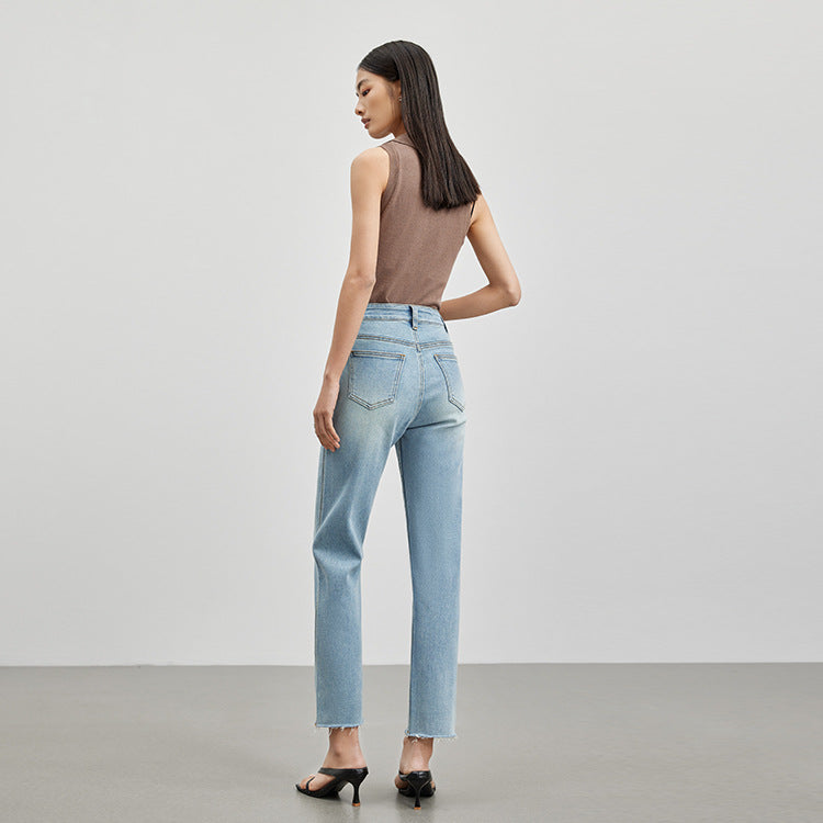 2025 High-end women's clothing, simple repair, high and thin nine-point straight pants, elastic light blue polished white Popularan jeans