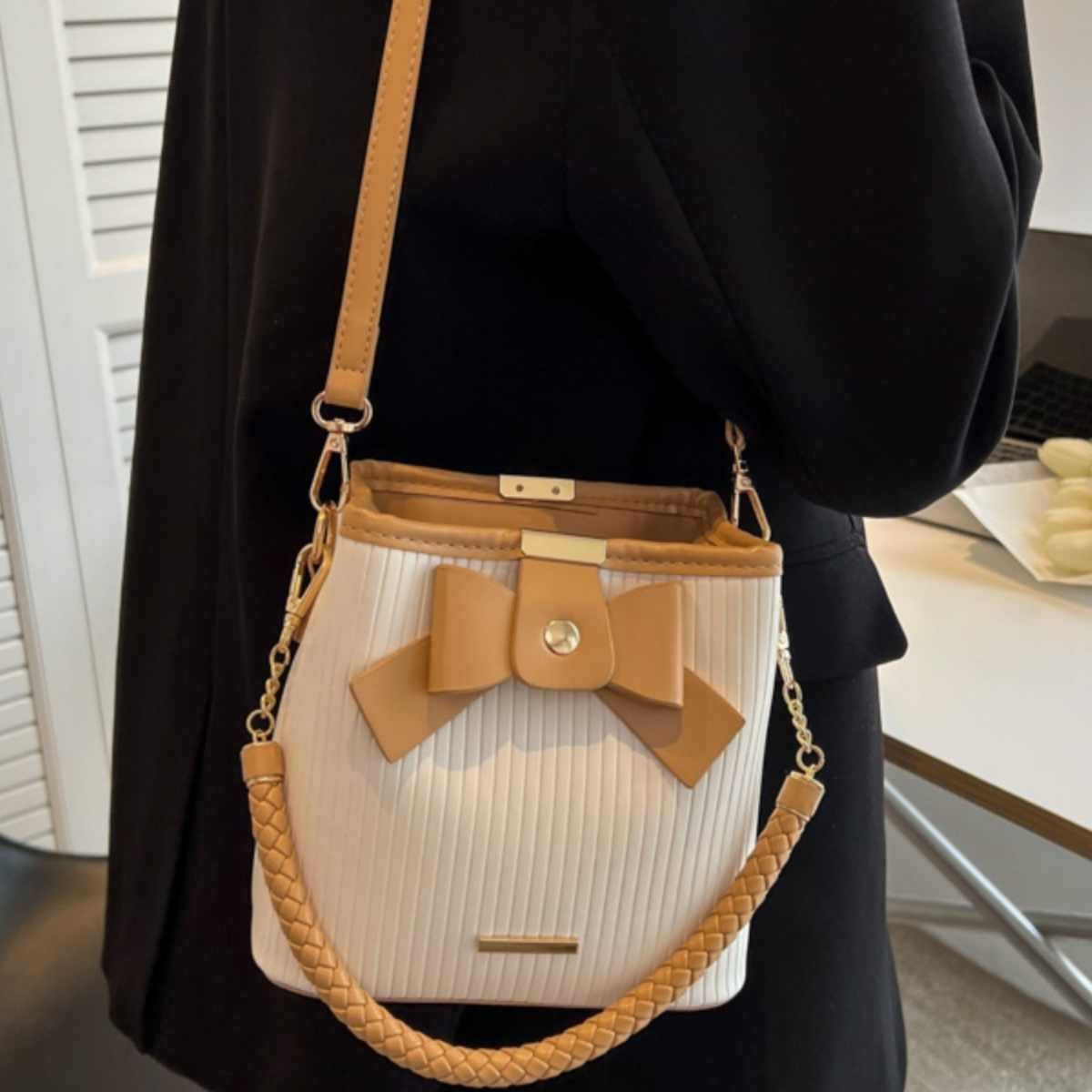 FLOWERSVERSE 2025 Niche design bow bag women's popular new trendy simple portable bucket bag high-end shoulder messenger bag