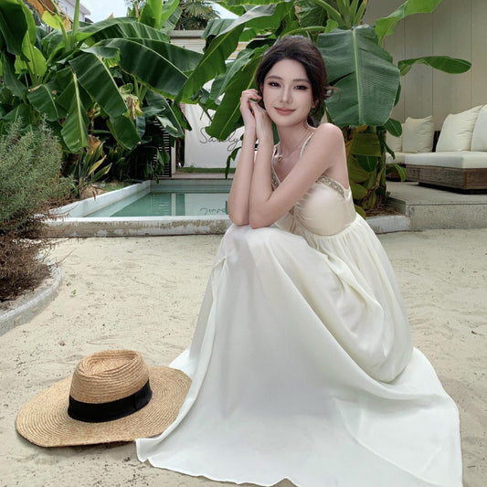 2025 High-end light luxury celebrity banquet neck sling dress niche design seaside vacation beach dress long dress