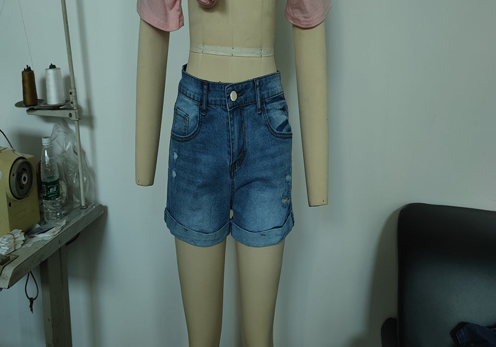 Popular trade elastic hole flanged denim shorts women