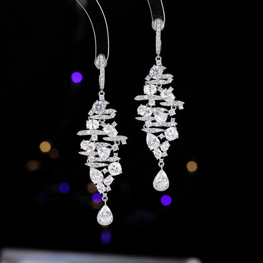 2025 New long fashionable fringed water drop earrings S925 silver needle heavy industry jewelry earrings simple temperament wholesale
