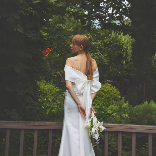 2025 travel photography light wedding dress bride simple temperament satin one-word shoulder fishtail going out yarn white location dress skirt