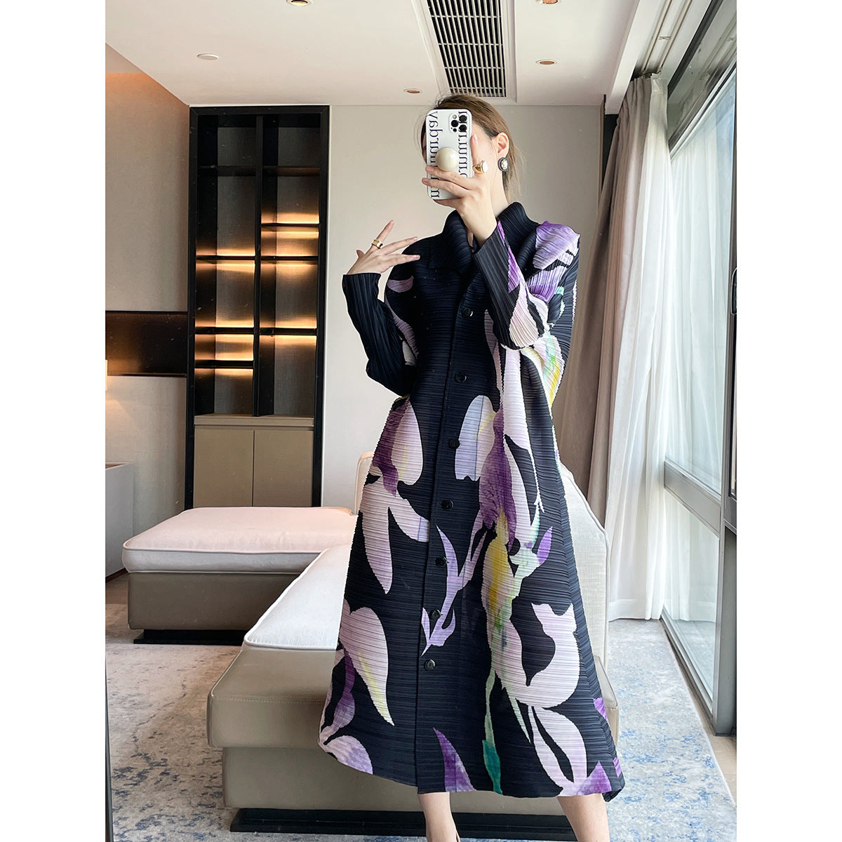 Pleated niche design sense, printing temperament, elegant lapel Miyake dress, loose cover meat and thin big swing skirt women