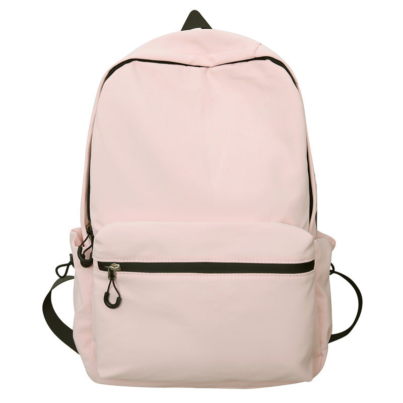 2025 popular lightweight solid color schoolbag female college student travel fashion high school student large capacity backpack middle school student backpack