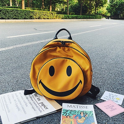 flowersverse Back to school Funny Smiling Face Backpack Women Laptop Bag Big Capacity Cartoon Printed Students Backpacks Children Nylon Travel Bag Yellow