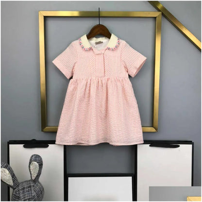 Girls Dresses 23Ss Princess Dress Short-Sleeved Kids Designer Clothes Lapel Lattice Splicing Belt Shirtdress Big Shirt Skirts Drop Del Dhnu8