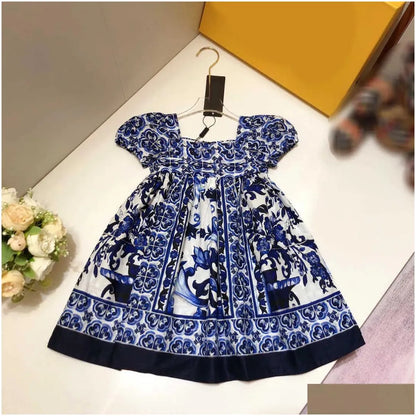 Girls Dresses 23Ss Princess Dress Short-Sleeved Kids Designer Clothes Lapel Lattice Splicing Belt Shirtdress Big Shirt Skirts Drop Del Dhnu8