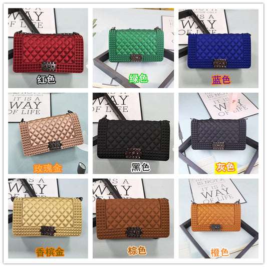 FLOWERSVERSE   New Ladies Fashionable Stylish Decorative Rivets One Shoulder Crossbody Gun Color Chain PVC Gel Bag