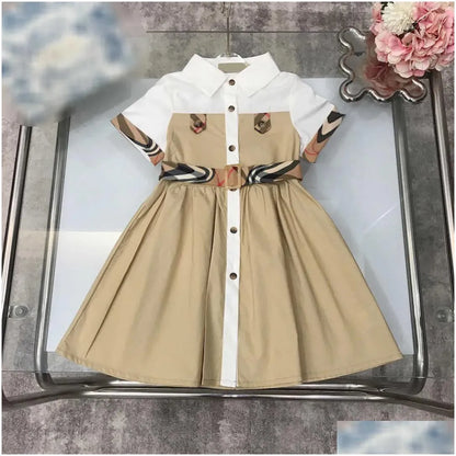 Girls Dresses 23Ss Princess Dress Short-Sleeved Kids Designer Clothes Lapel Lattice Splicing Belt Shirtdress Big Shirt Skirts Drop Del Dhnu8