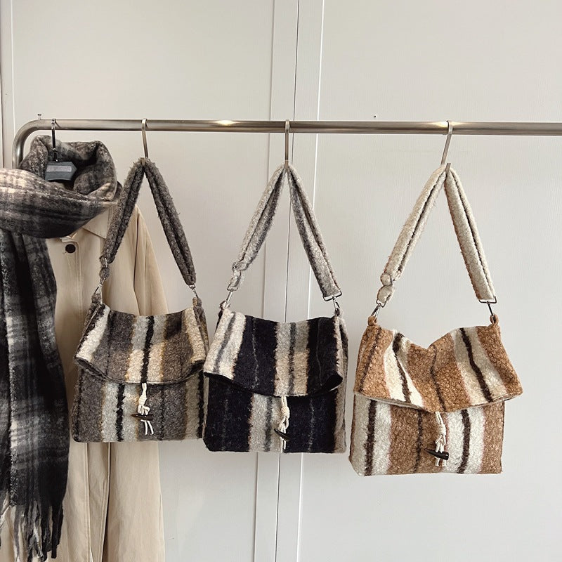 FLOWERSVERSE 2025 popular autumn and winter new striped woolen shoulder bag fashion lamb wool folding horn buckle Korean version fashion messenger bag