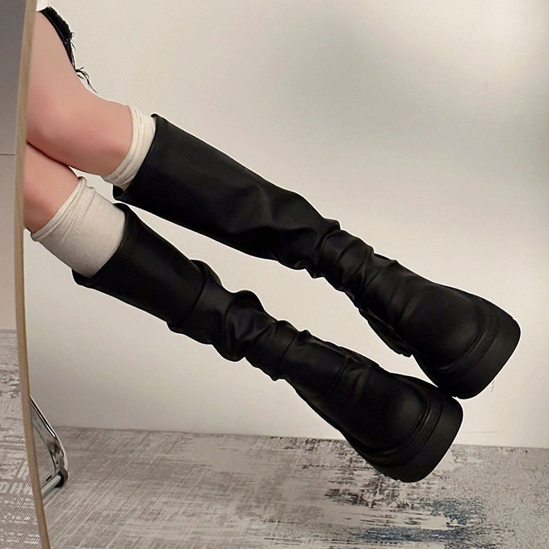 2025  Knight boots are popular this year. Tall but knee black thick heel stacked boots, thin boots