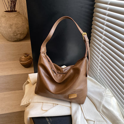 FLOWERSVERSE 2025 Autumn and winter new retro oily leather PU women's bag simple fashion iron brand small square brand armpit bag temperament commuter shoulder bag