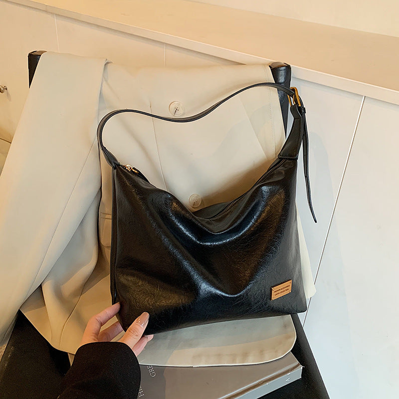 FLOWERSVERSE 2025 Autumn and winter new retro oily leather PU women's bag simple fashion iron brand small square brand armpit bag temperament commuter shoulder bag