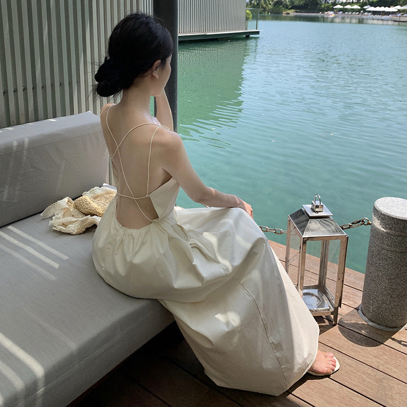 2025 Pure desire backless suspender dress female summer design sense Spice girl a word waist fairy seaside vacation long skirt