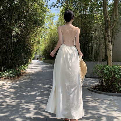 2025 Pure desire backless suspender dress female summer design sense Spice girl a word waist fairy seaside vacation long skirt