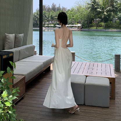 2025 Pure desire backless suspender dress female summer design sense Spice girl a word waist fairy seaside vacation long skirt