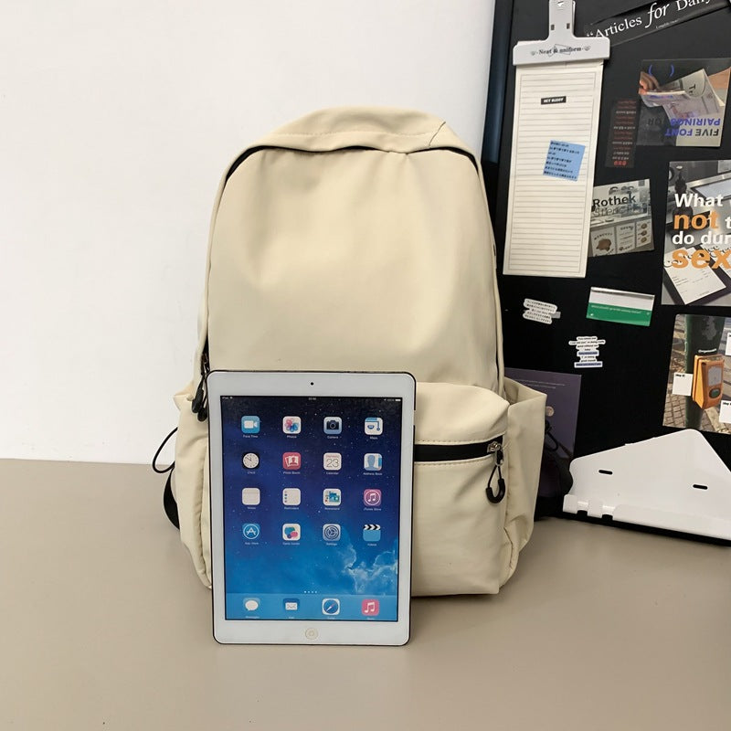 2025 popular lightweight solid color schoolbag female college student travel fashion high school student large capacity backpack middle school student backpack