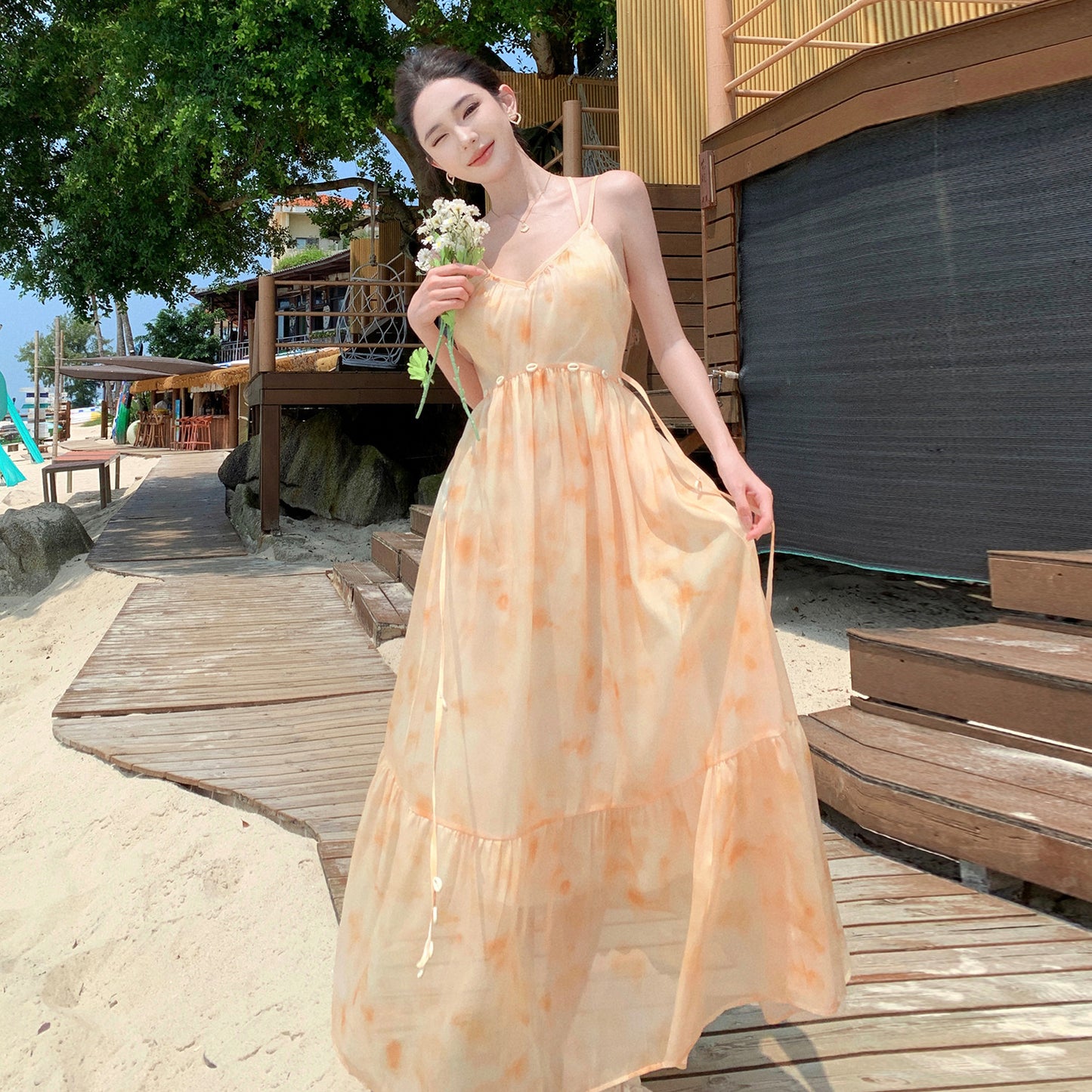 2025 High-end smudge printing V-neck suspender dress female summer seaside vacation  temperament big pendulum fairy long dress