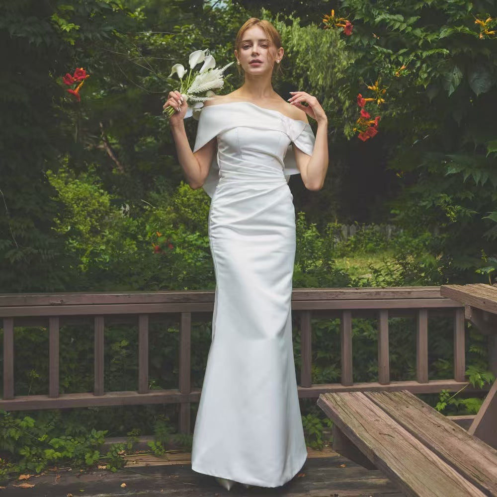 2025 travel photography light wedding dress bride simple temperament satin one-word shoulder fishtail going out yarn white location dress skirt