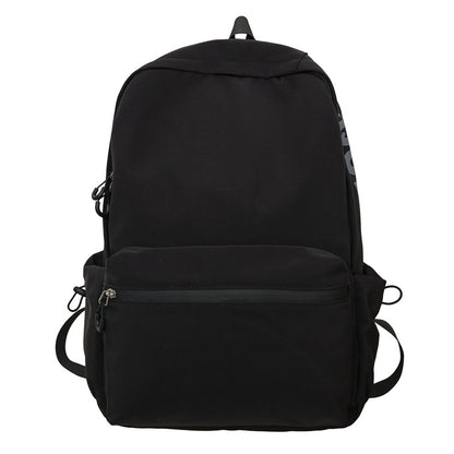 2025 popular lightweight solid color schoolbag female college student travel fashion high school student large capacity backpack middle school student backpack