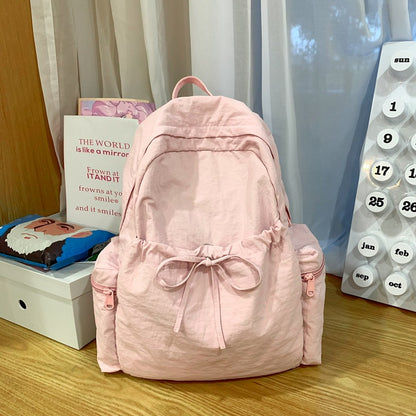 2025 School bag female college student cute bow simple junior high school student backpack female high school student large capacity backpack casual