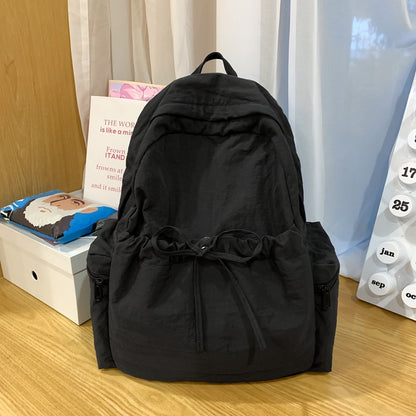 2025 School bag female college student cute bow simple junior high school student backpack female high school student large capacity backpack casual
