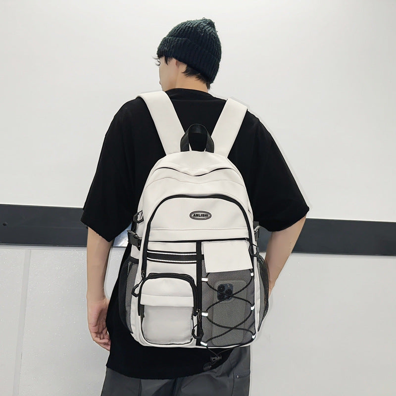 2025 School bag Junior high school female burden reduction backpack Middle school student school bag popular new high school girls large capacity super light men