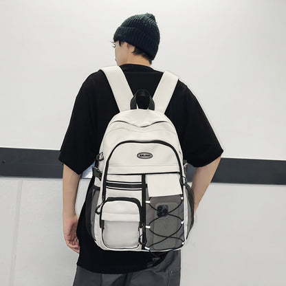 2025 School bag Junior high school female burden reduction backpack Middle school student school bag popular new high school girls large capacity super light men