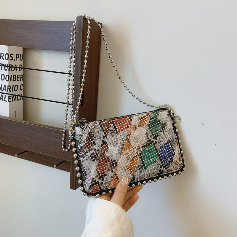 FLOWERSVERSE 2025 Cross-border wind bag women's new snake pattern splicing contrasting color envelope bag 2025 trendy Popular style women's bead chain shoulder bag