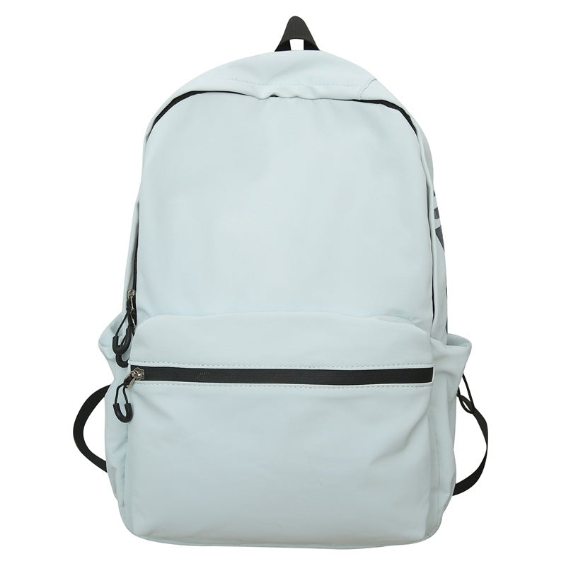 2025 popular lightweight solid color schoolbag female college student travel fashion high school student large capacity backpack middle school student backpack