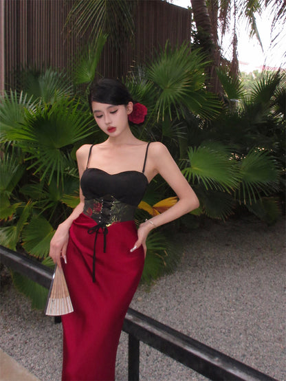 2025 Red and black contrasting colors retro jacquard hip-wrapped long dress women's summer new vacation slim and thin suspender fishtail dress