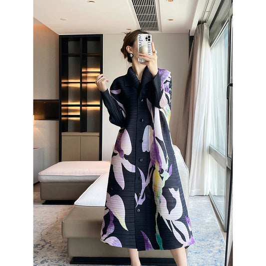 Pleated niche design sense, printing temperament, elegant lapel Miyake dress, loose cover meat and thin big swing skirt women