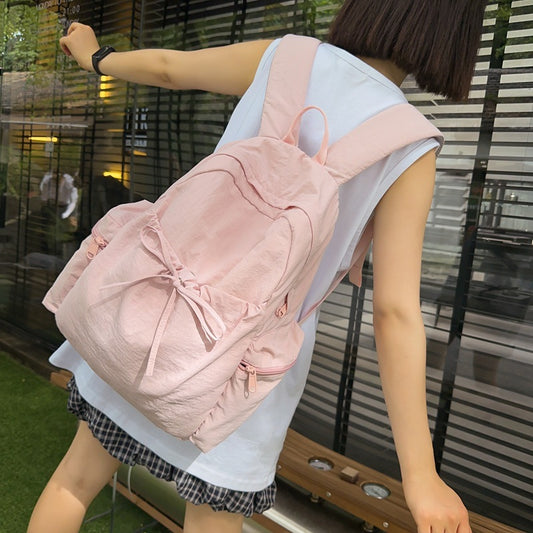 2025 School bag female college student cute bow simple junior high school student backpack female high school student large capacity backpack casual