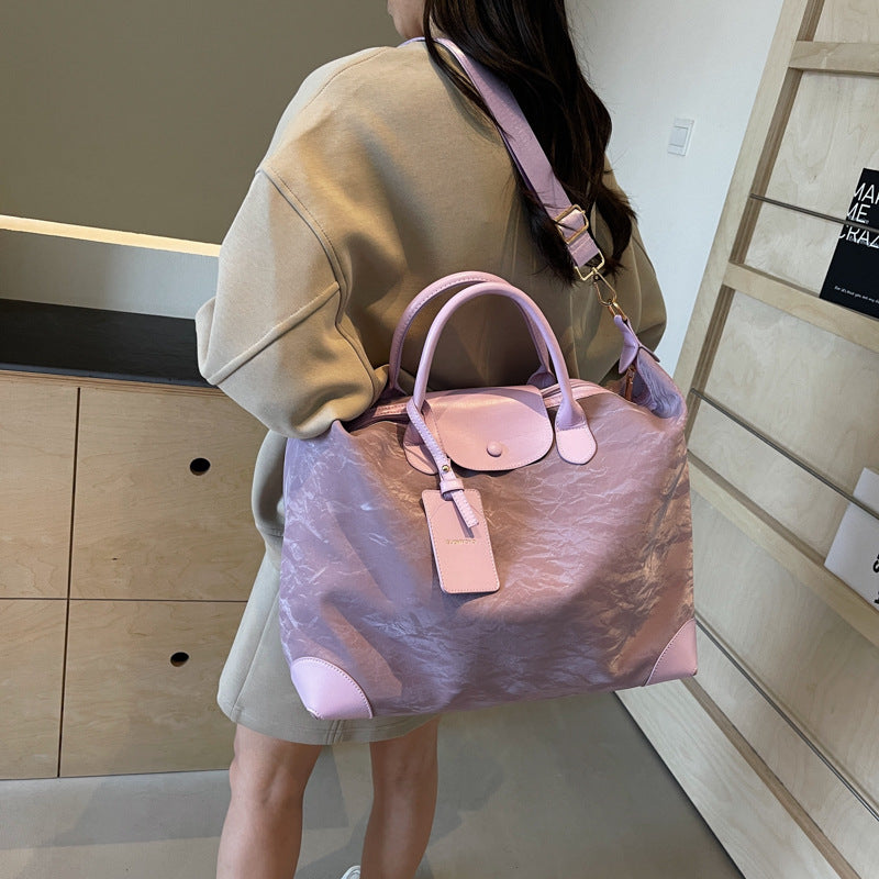 2025 New large-capacity portable travel bag, women's light sports fitness bag, outdoor leisure travel bag, duffel bag.