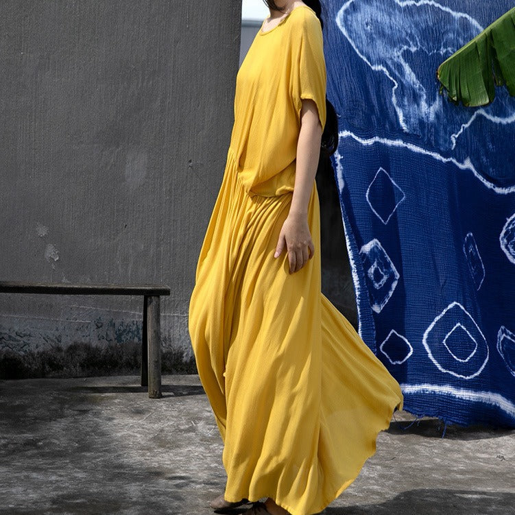 a new pleated long dress in early summer, irregular short-sleeved elegant and comfortable dress