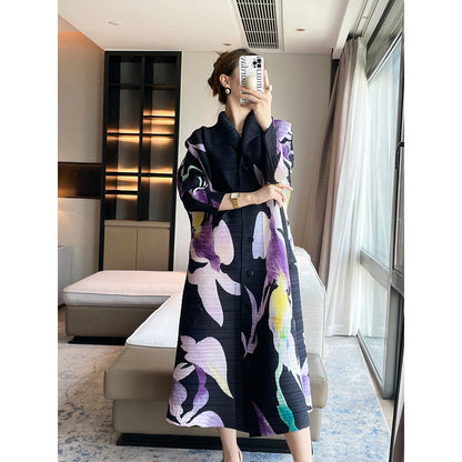 Pleated niche design sense, printing temperament, elegant lapel Miyake dress, loose cover meat and thin big swing skirt women