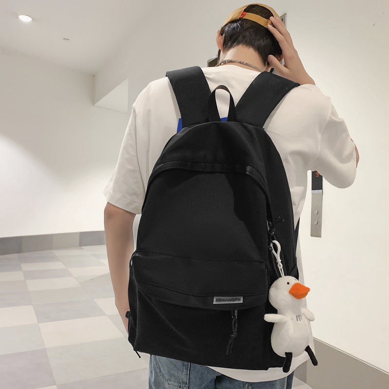 2025 Couple backpack simple large capacity travel backpack female leisure Japanese junior high school student high school student schoolbag male