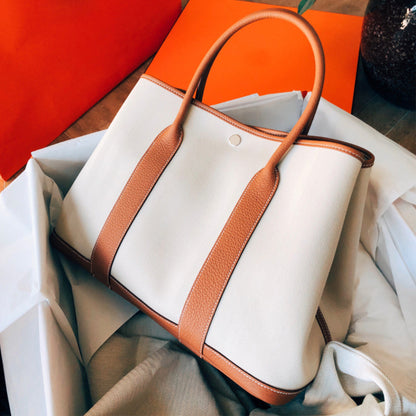 FLOWERSVERSE 2025 High quality handmade wax line bucket bag women's bag tote bag canvas color matching garden bag large bag shopping bag catfish bag