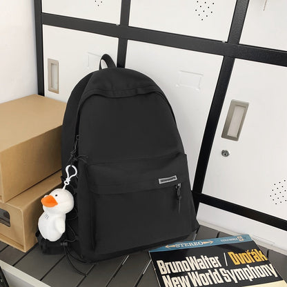 2025 Couple backpack simple large capacity travel backpack female leisure Japanese junior high school student high school student schoolbag male