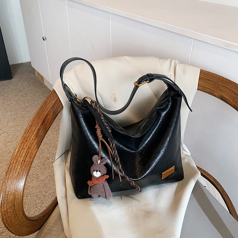 FLOWERSVERSE 2025 Autumn and winter new retro oily leather PU women's bag simple fashion iron brand small square brand armpit bag temperament commuter shoulder bag