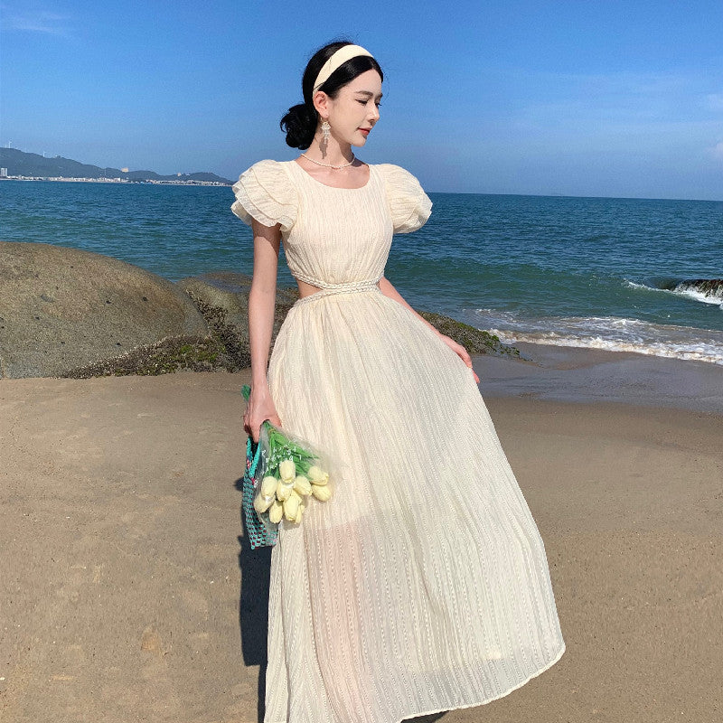 2025 Niche design sense hollow waist seaside vacation flying sleeve dress women's summer Sanya travel photo dress