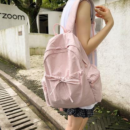 2025 School bag female college student cute bow simple junior high school student backpack female high school student large capacity backpack casual