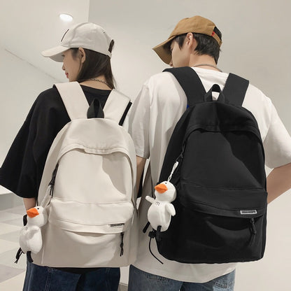 2025 Couple backpack simple large capacity travel backpack female leisure Japanese junior high school student high school student schoolbag male