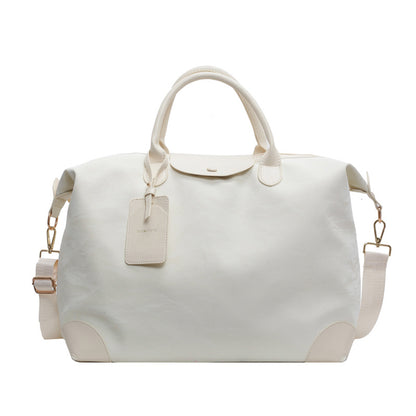 2025 New large-capacity portable travel bag, women's light sports fitness bag, outdoor leisure travel bag, duffel bag.