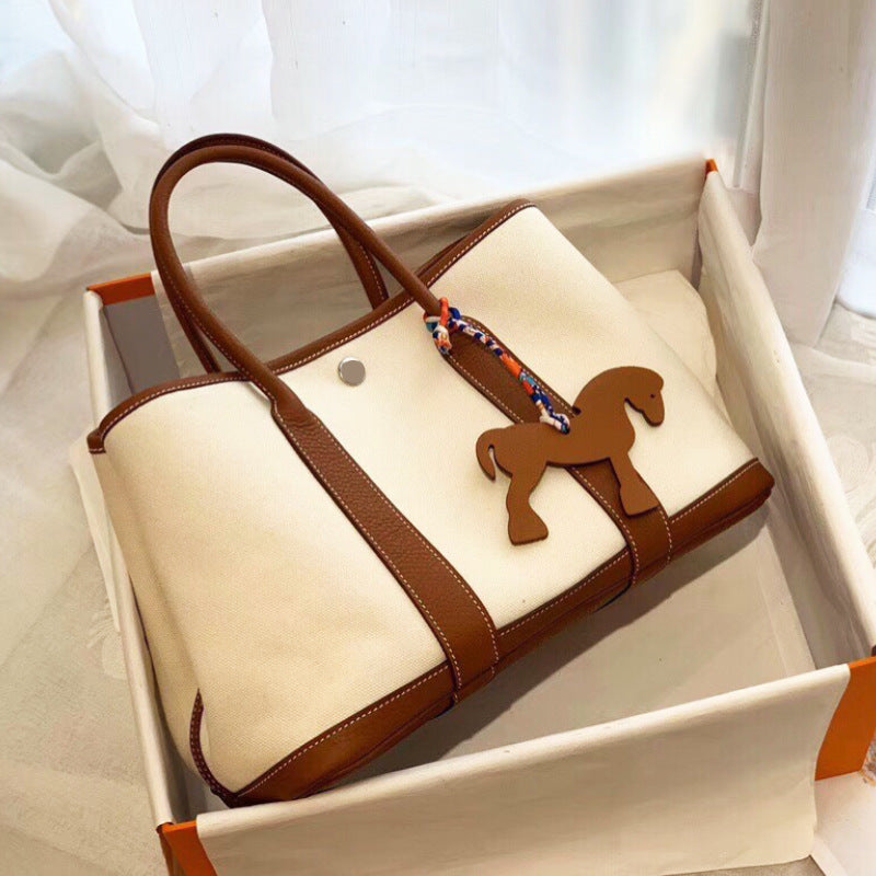 FLOWERSVERSE 2025 High quality handmade wax line bucket bag women's bag tote bag canvas color matching garden bag large bag shopping bag catfish bag