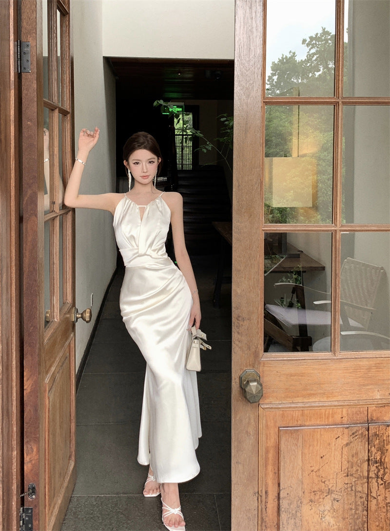 2025 High-end banquet fishtail evening dress women's light luxury niche engagement certificate host white neck suspender dress