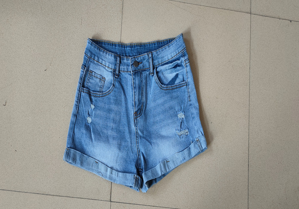 Popular trade elastic hole flanged denim shorts women
